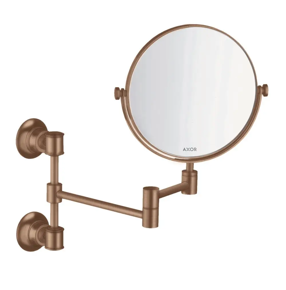 Spiegel mit drehbarem, kreisförmigem Design und Wandmontage. Metallrahmen in brushed red gold. Produkt der Marke AXOR mit flexibler Halterung für verschiedene Blickwinkel.